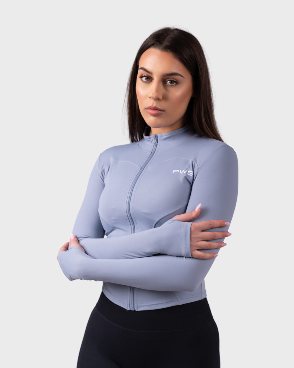 PWG Evolve Sculpt Fit Jacket in Lilac Blue, full zip, high neck, front PWG logo, thumbhole sleeves, breathable fabric - Front View