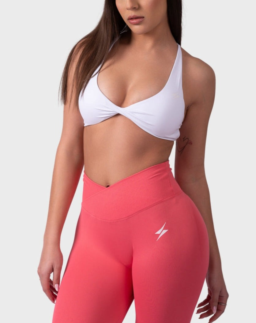 PWG Active Evolve Backless Sports Bra in White, breathable, high-performance, with front logo design - Front View