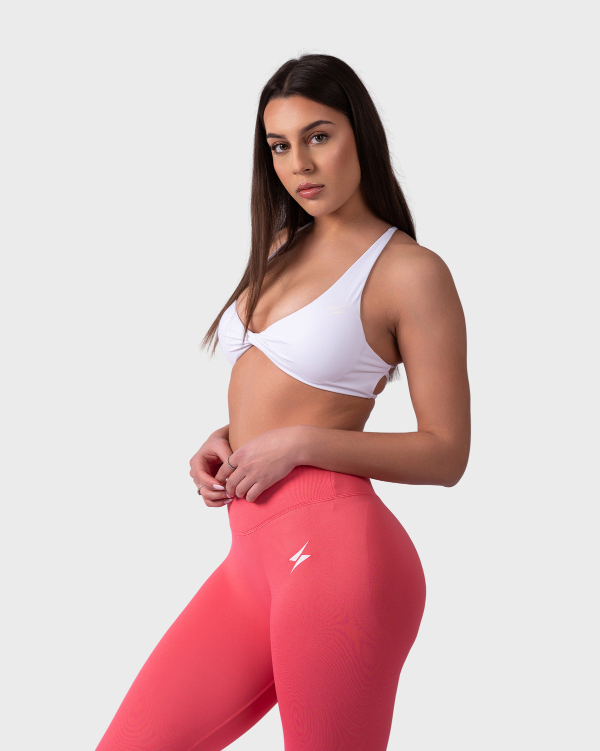 PWG Active Evolve Backless Sports Bra in White, breathable, high-performance, with front logo design