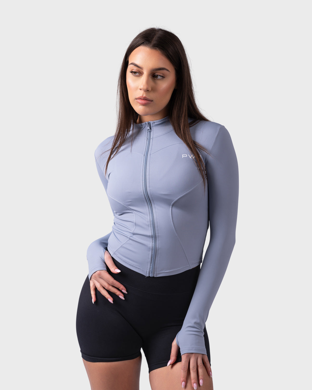 PWG Evolve Sculpt Fit Jacket in Lilac Blue, full zip, high neck, front PWG logo, thumbhole sleeves, breathable fabric