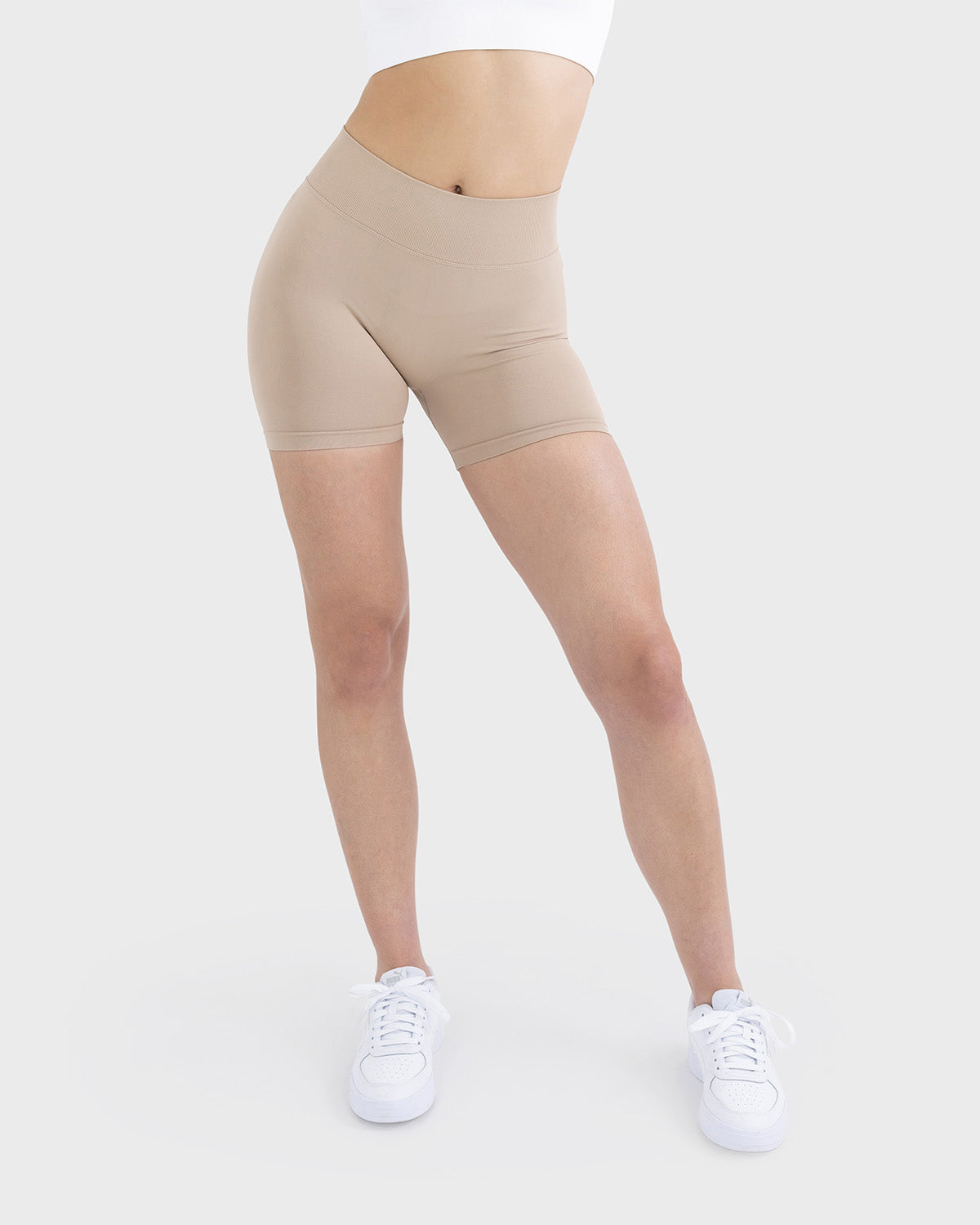 PWG Active Form Sculpting Shorts in Silent Ivory, high ribbed waistband, sculpting design, scrunch back, 4” inseam - Front View