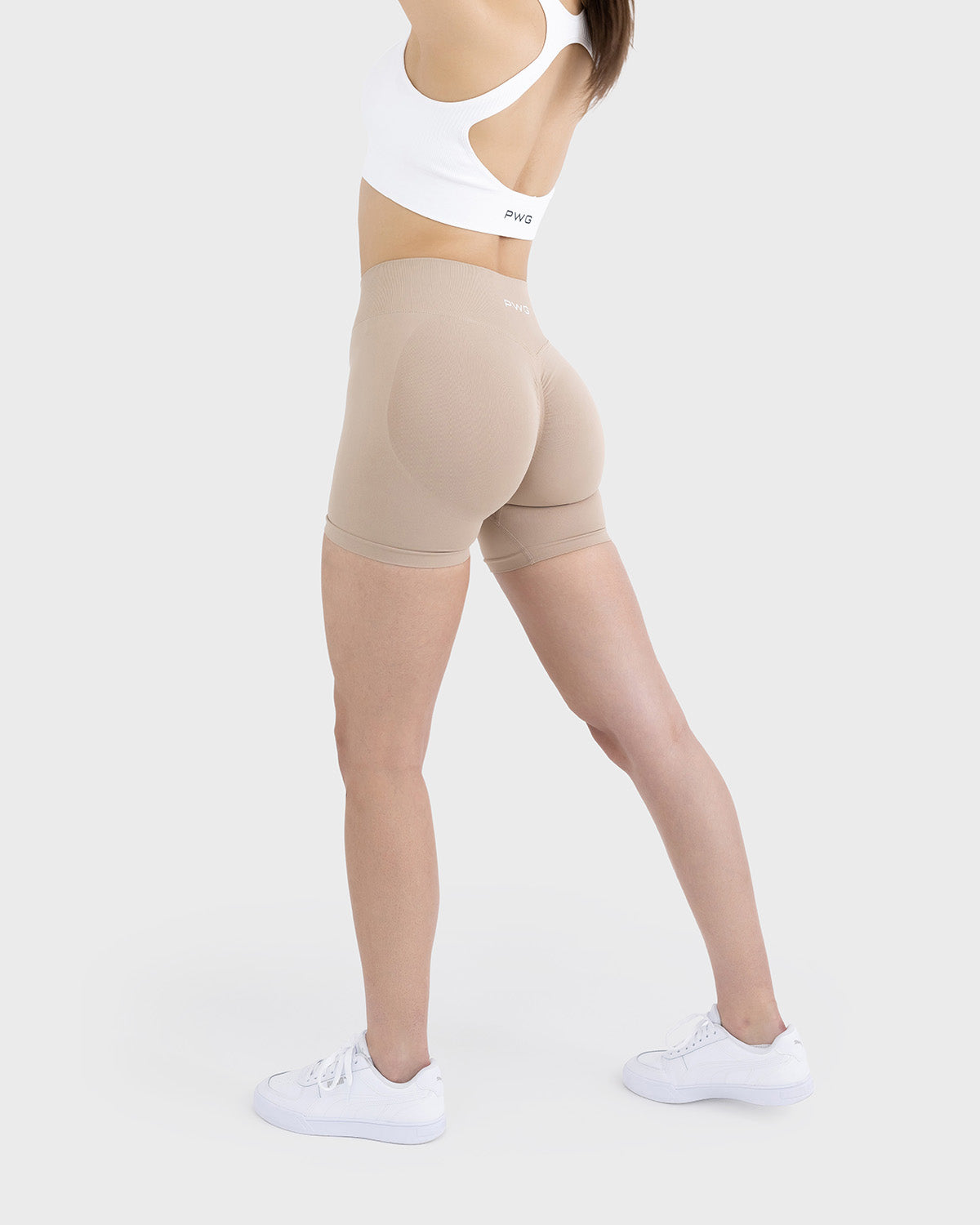 PWG Active Form Sculpting Shorts in Silent Ivory, high ribbed waistband, sculpting design, scrunch back, 4” inseam - Side view