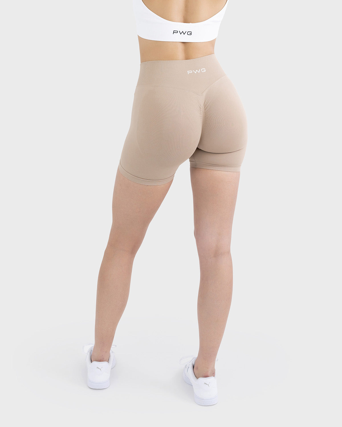 PWG Active Form Sculpting Shorts in Silent Ivory, high ribbed waistband, sculpting design, scrunch back, 4” inseam - Back View