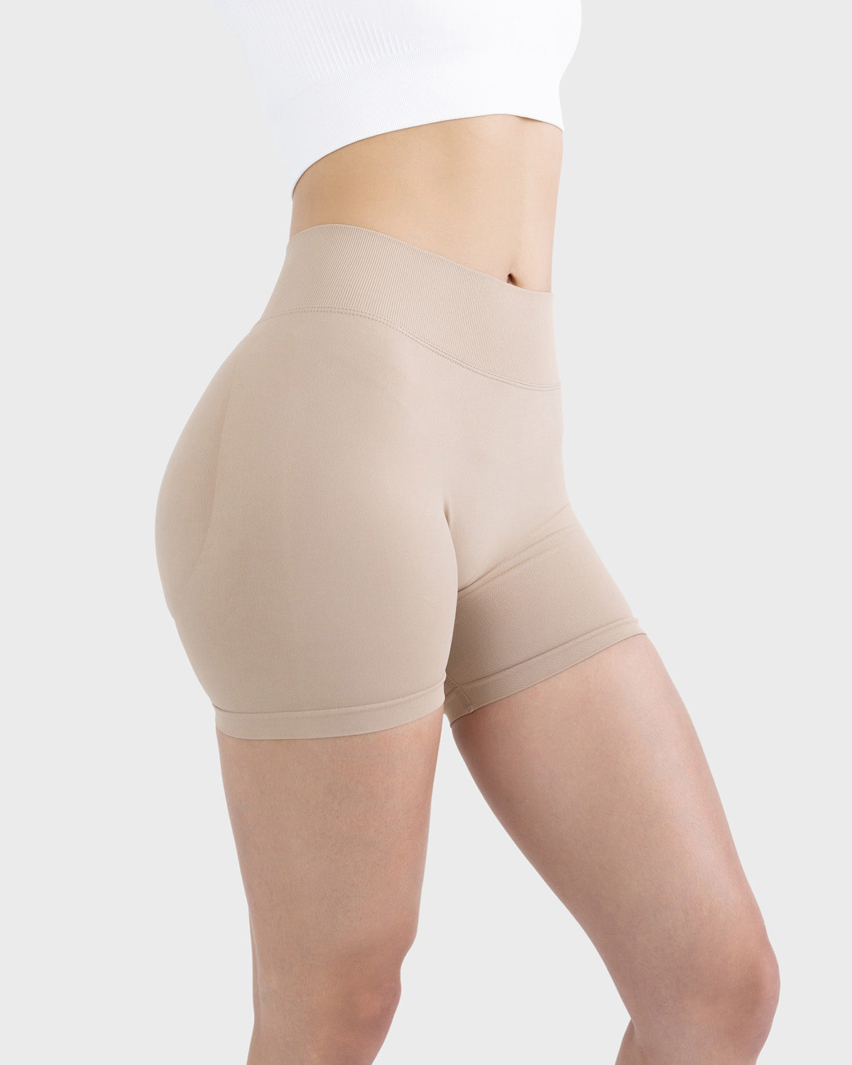 PWG Active Form Sculpting Shorts in Silent Ivory, high ribbed waistband, sculpting design, scrunch back, 4” inseam - Side View