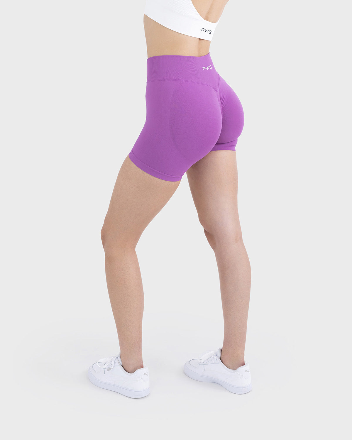 PWG Active Form Sculpting Shorts in Radiant Berry, high ribbed waistband, sculpting design, scrunch back, 4” inseam - Side View