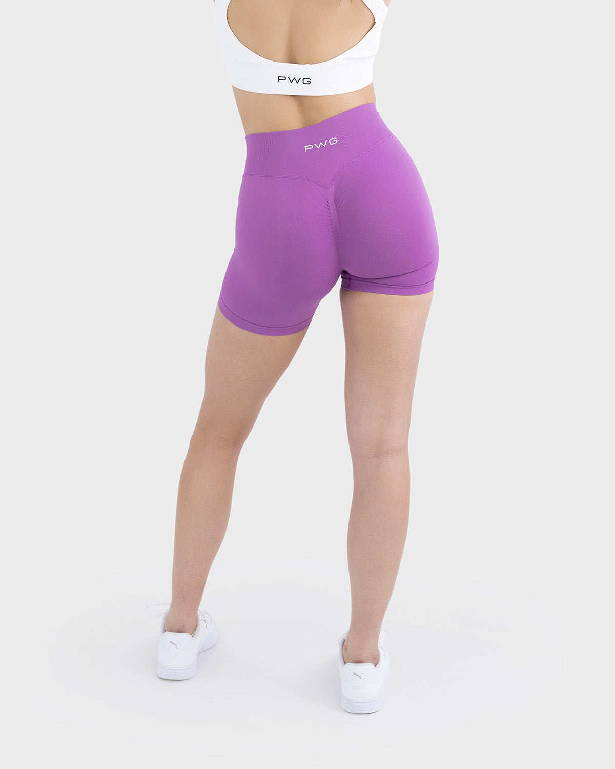 PWG Active Form Sculpting Shorts in Radiant Berry, high ribbed waistband, sculpting design, scrunch back, 4” inseam - Back View