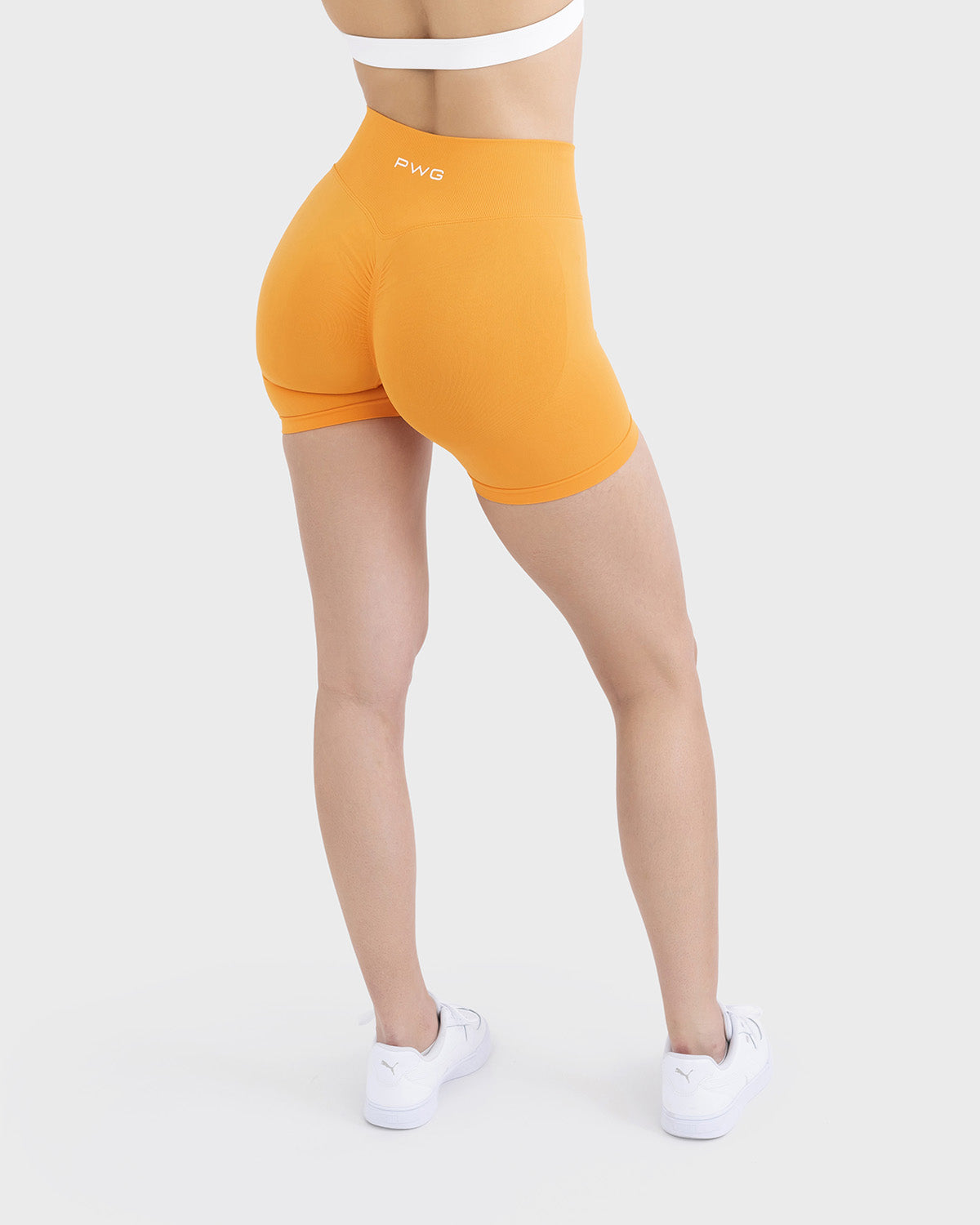 PWG Active Form Sculpting Shorts in Amber Blaze, high ribbed waistband, sculpting design, scrunch back, 4” inseam
