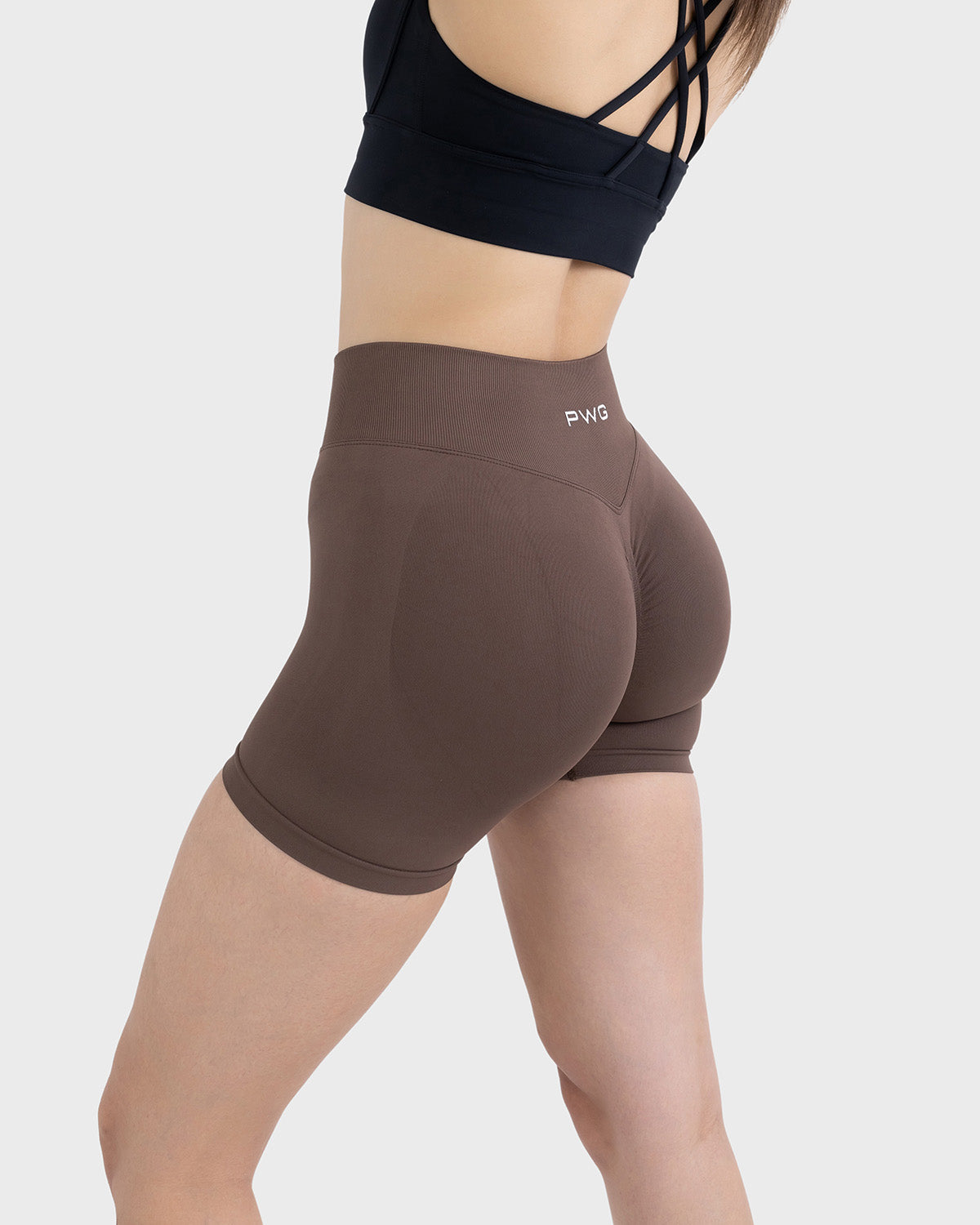 PWG Active Form Sculpting Shorts in Espresso Walnut, high ribbed waistband, sculpting design, scrunch back, 4” inseam - Back View