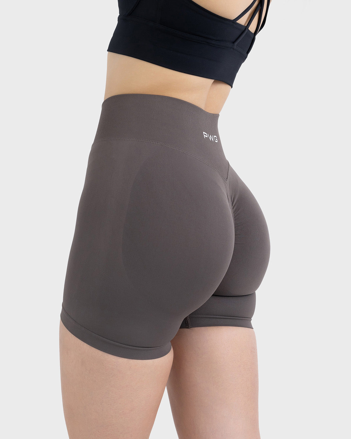 PWG Active Form Sculpting Shorts in Graphite, high ribbed waistband, sculpting design, scrunch back, 4” inseam - Back View
