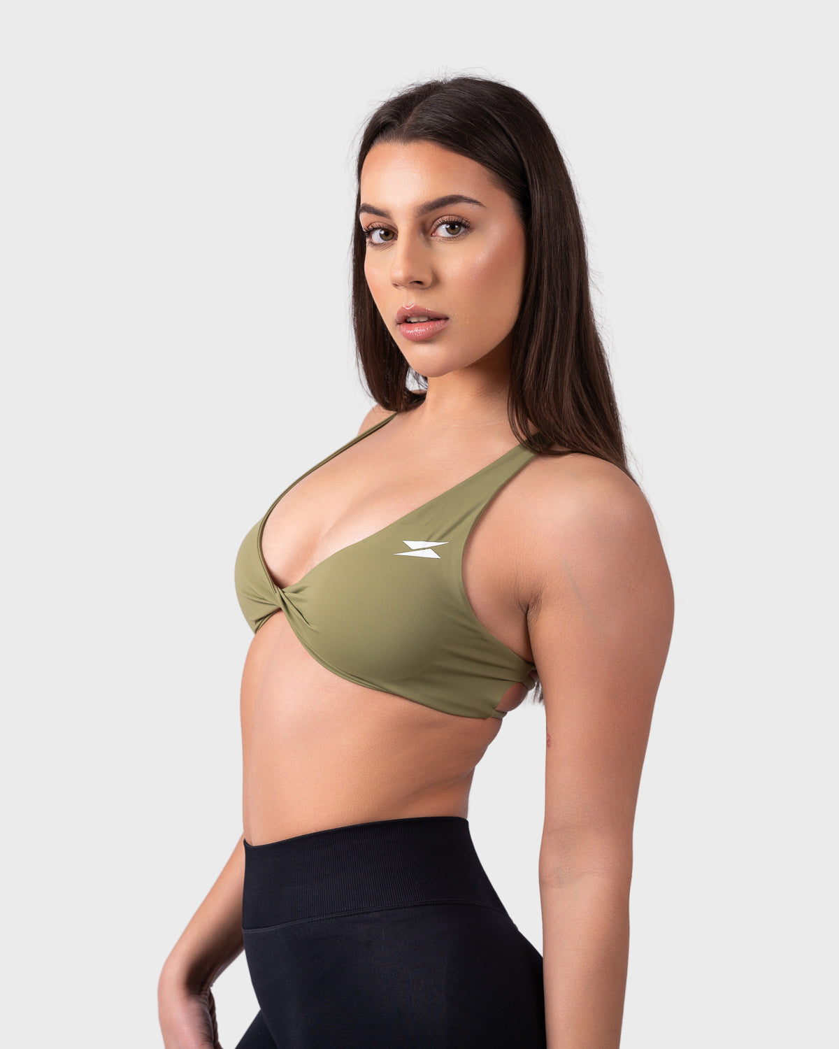 PWG Active Evolve Backless Sports Bra in Olive Green, breathable, high-performance, with front logo design