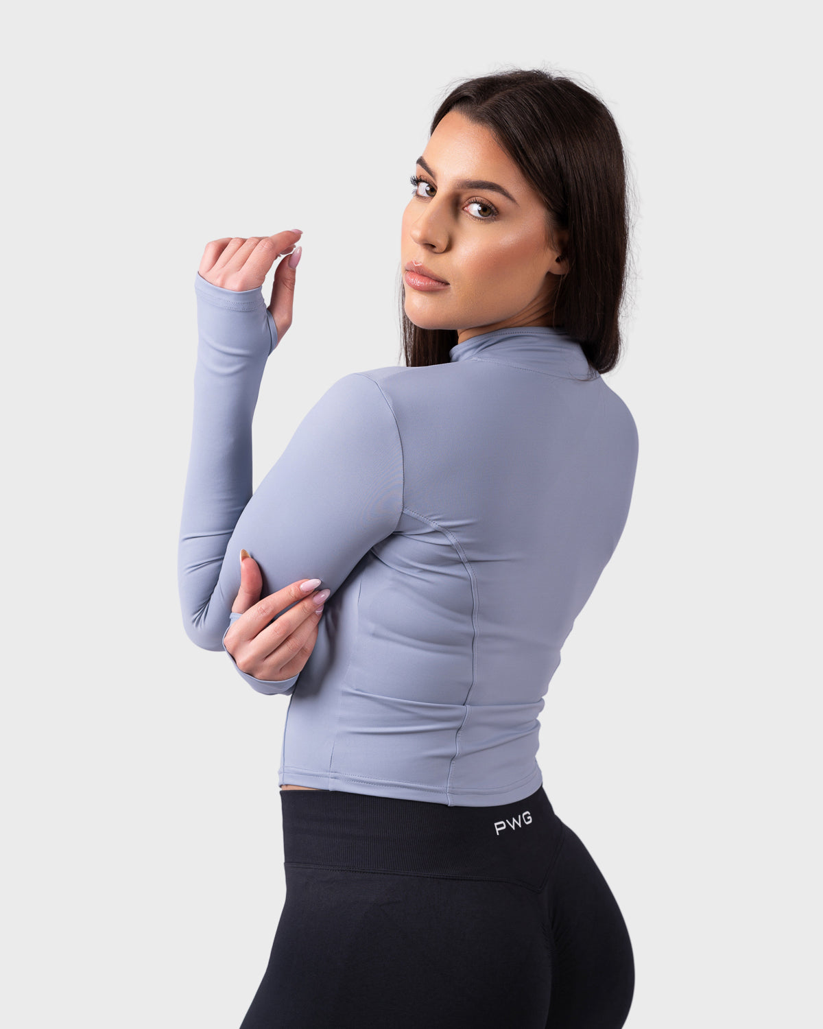 PWG Evolve Sculpt Fit Jacket in Lilac Blue, full zip, high neck, front PWG logo, thumbhole sleeves, breathable fabric - Back View