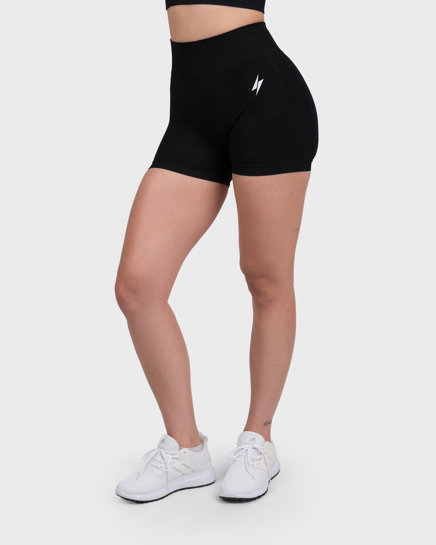 FlexActive High Waist Shorts from PWG Active in black, front view with lightning logo.