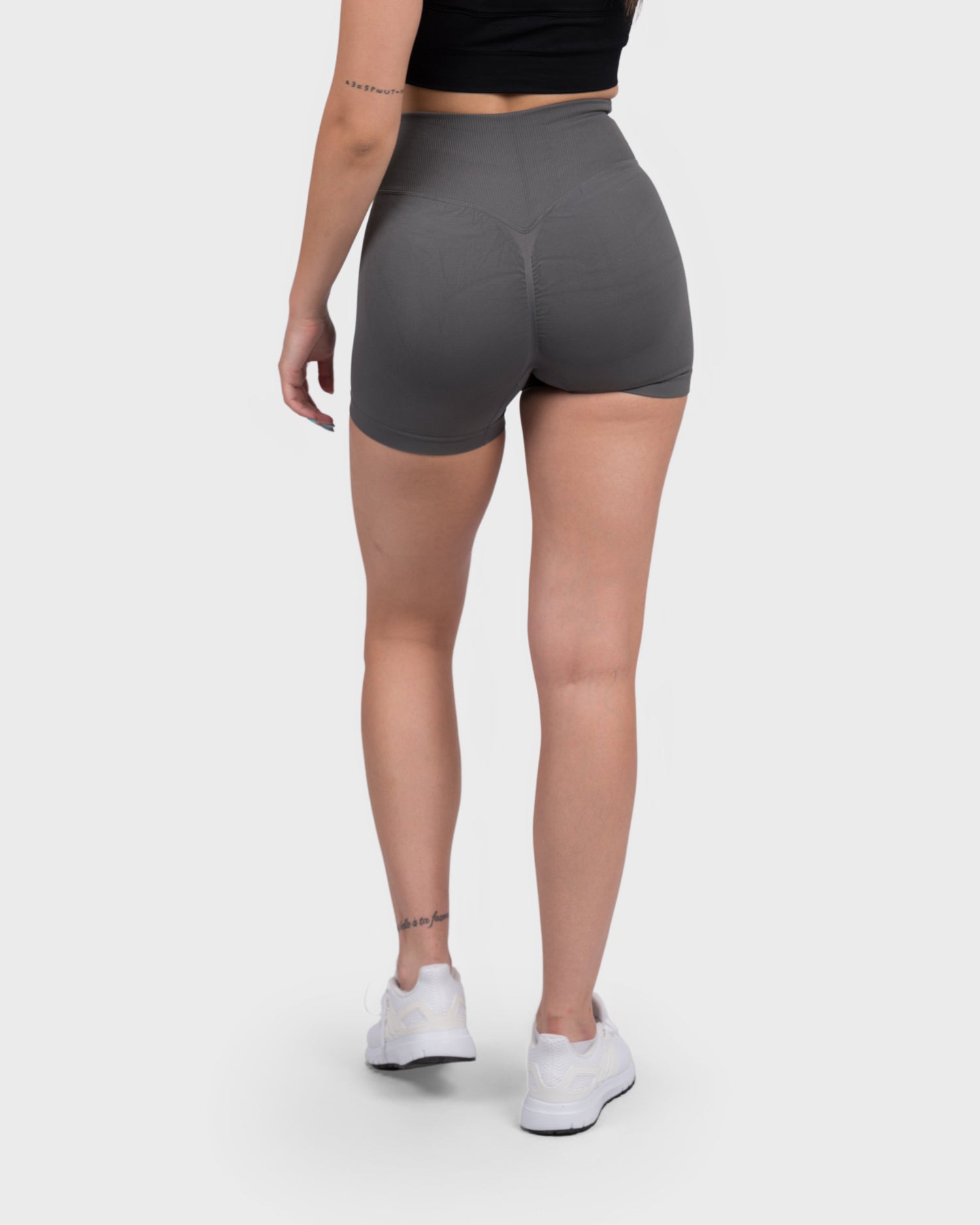 PWG Active Evolve V-Sculpt Shorts in Dark Grey – High-waisted, form-fitting gym shorts with a stylish V-cut waistband.