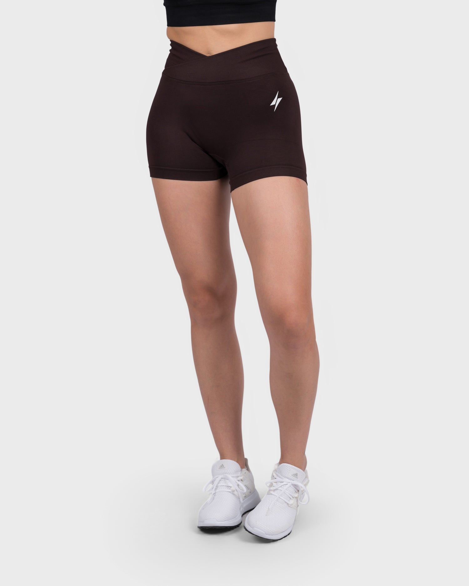 PWG Active Evolve V-Sculpt Shorts in Dark Brown – High-waisted, form-fitting gym shorts with a stylish V-cut waistband - Front View