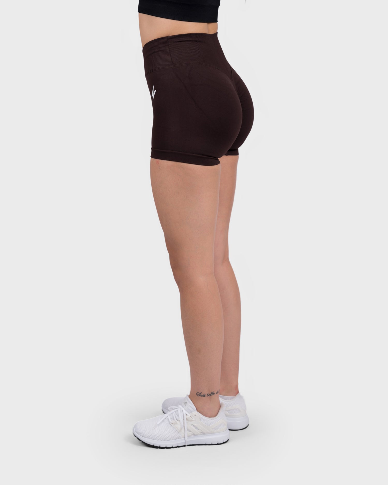 PWG Active Evolve V-Sculpt Shorts in Dark Brown – High-waisted, form-fitting gym shorts with a stylish V-cut waistband - Side View