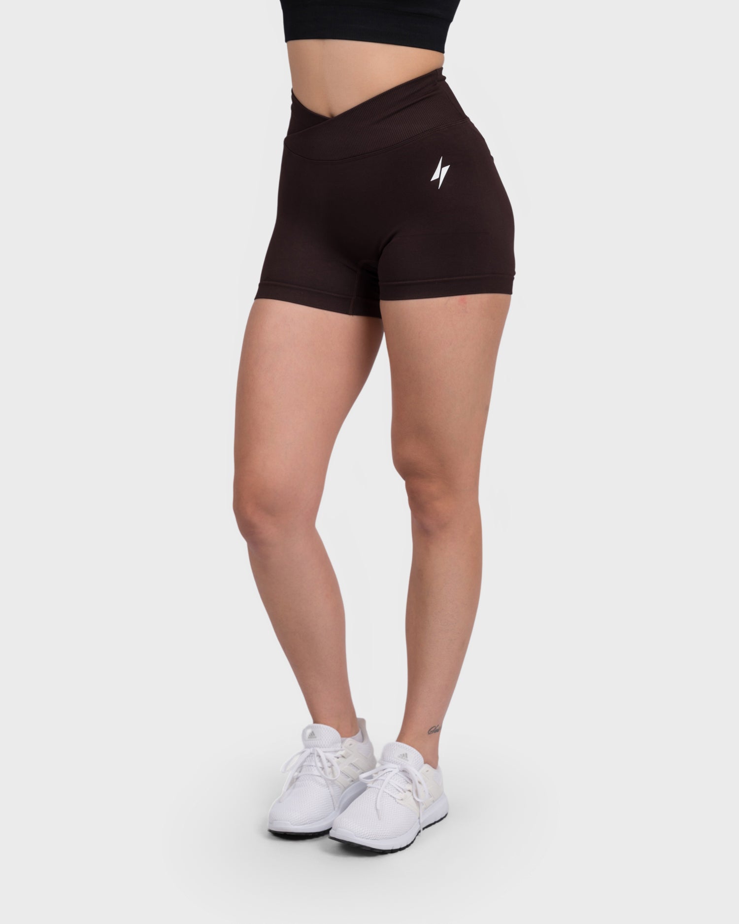 PWG Active Evolve V-Sculpt Shorts in Dark Brown – High-waisted, form-fitting gym shorts with a stylish V-cut waistband - Front View