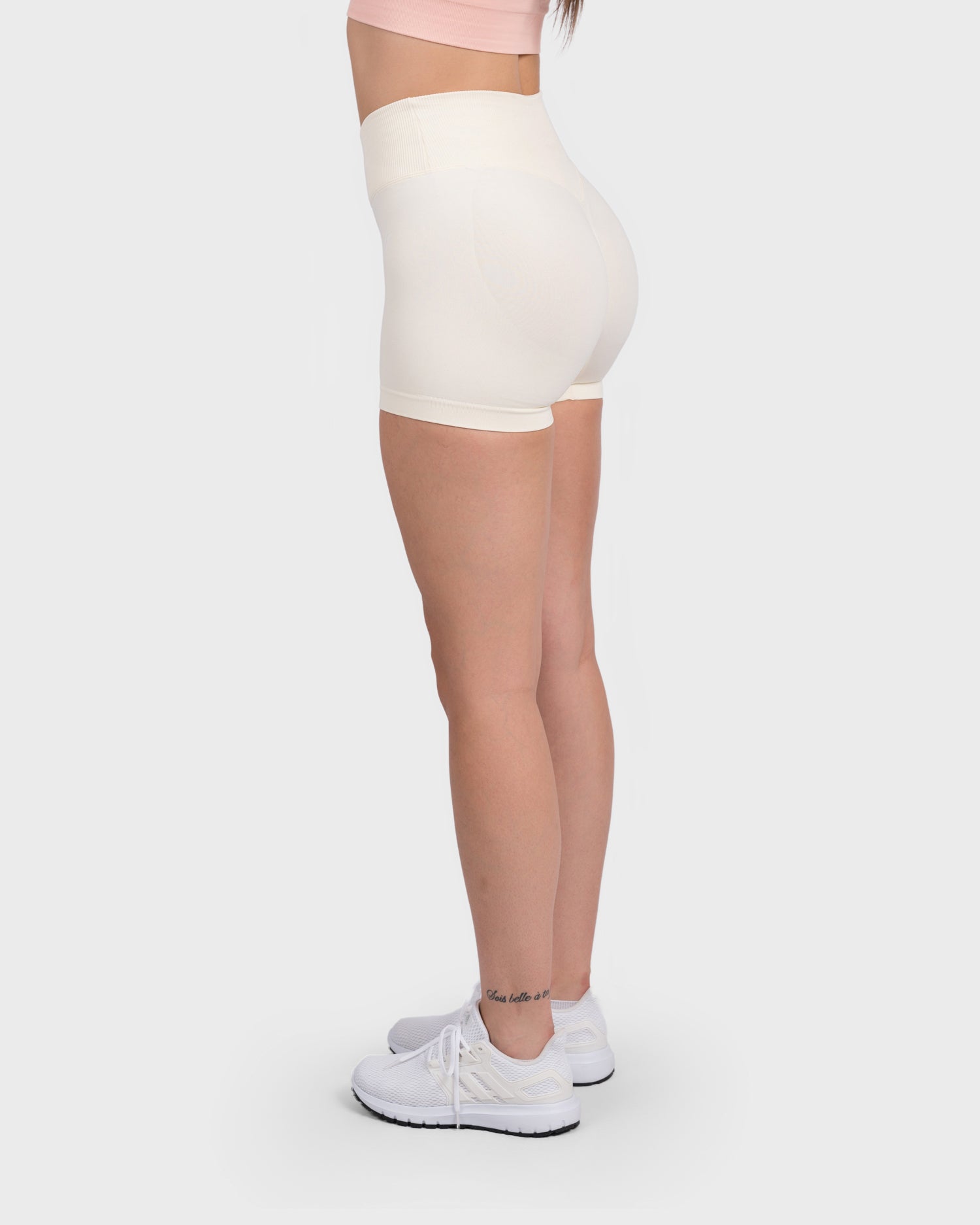 PWG Active Evolve V-Sculpt Shorts in White – High-waisted, form-fitting gym shorts with a stylish V-cut waistband - Side View
