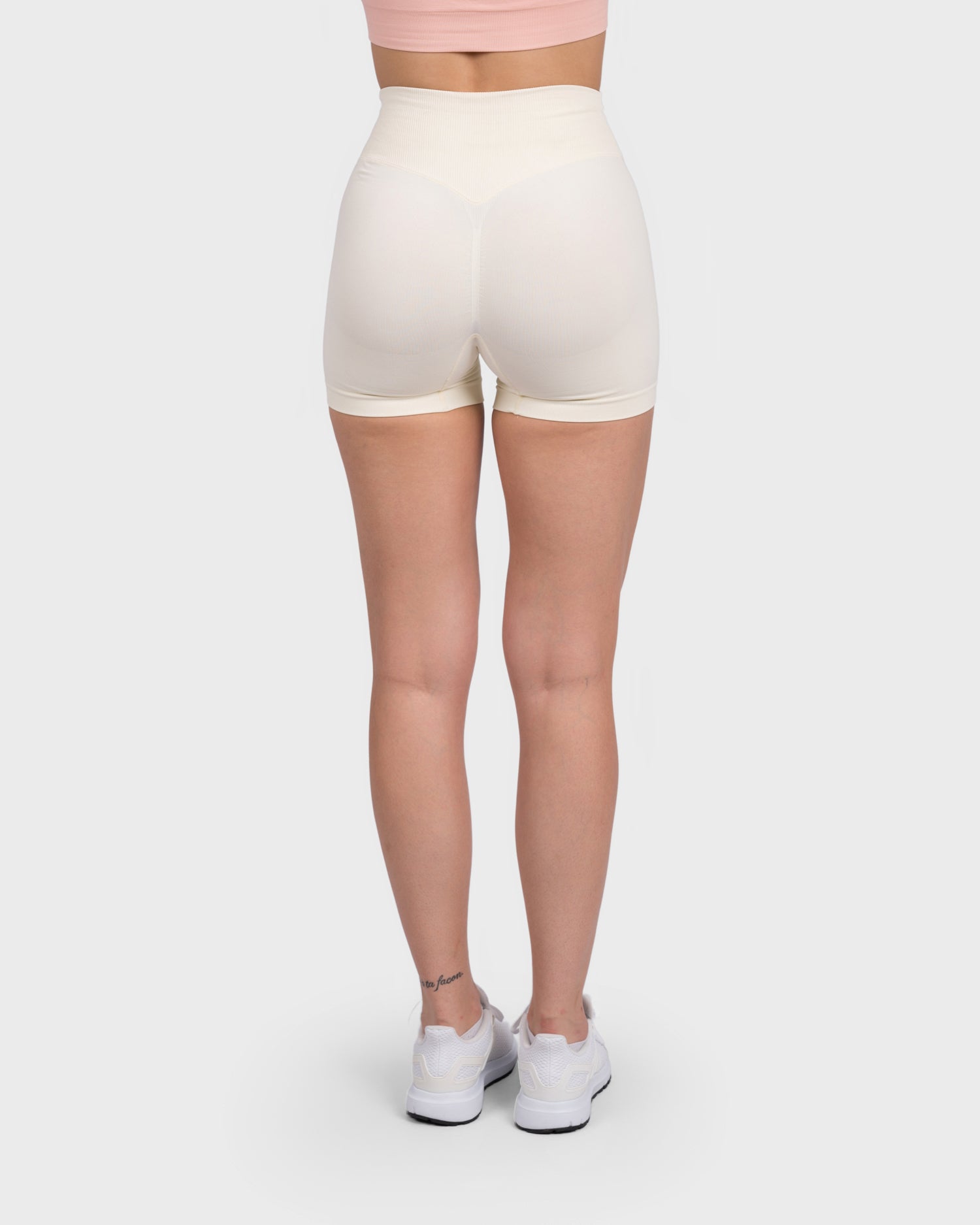 PWG Active Evolve V-Sculpt Shorts in White – High-waisted, form-fitting gym shorts with a stylish V-cut waistband - Back View