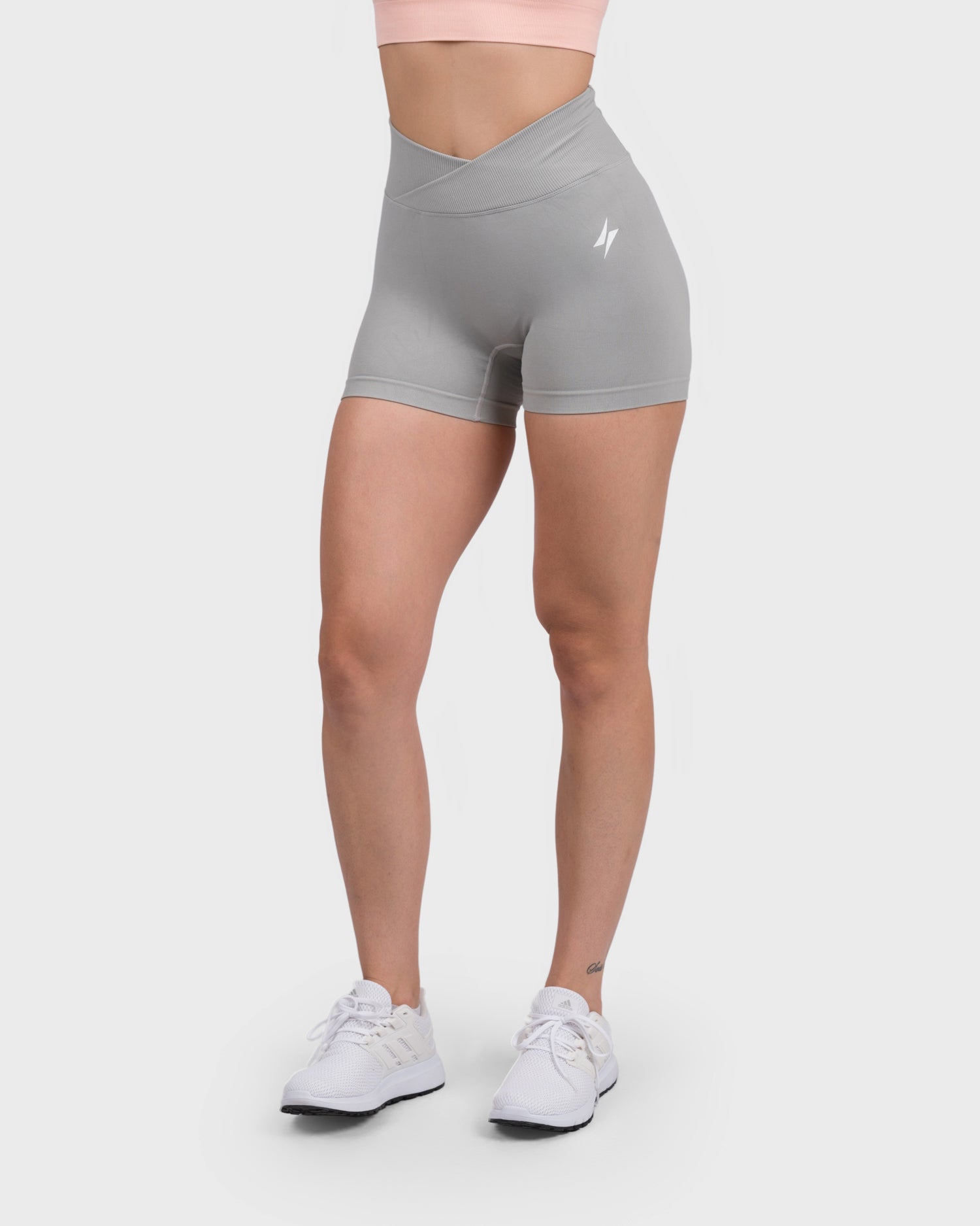 PWG Active Evolve V-Sculpt Shorts in Light Grey – High-waisted, form-fitting gym shorts with a stylish V-cut waistband
