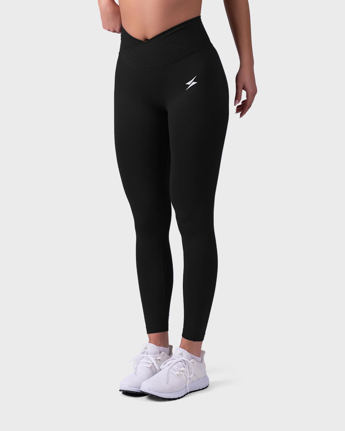 Full front view of black Evolve Sculpt Leggings, V-shaped waistband and ankle length.