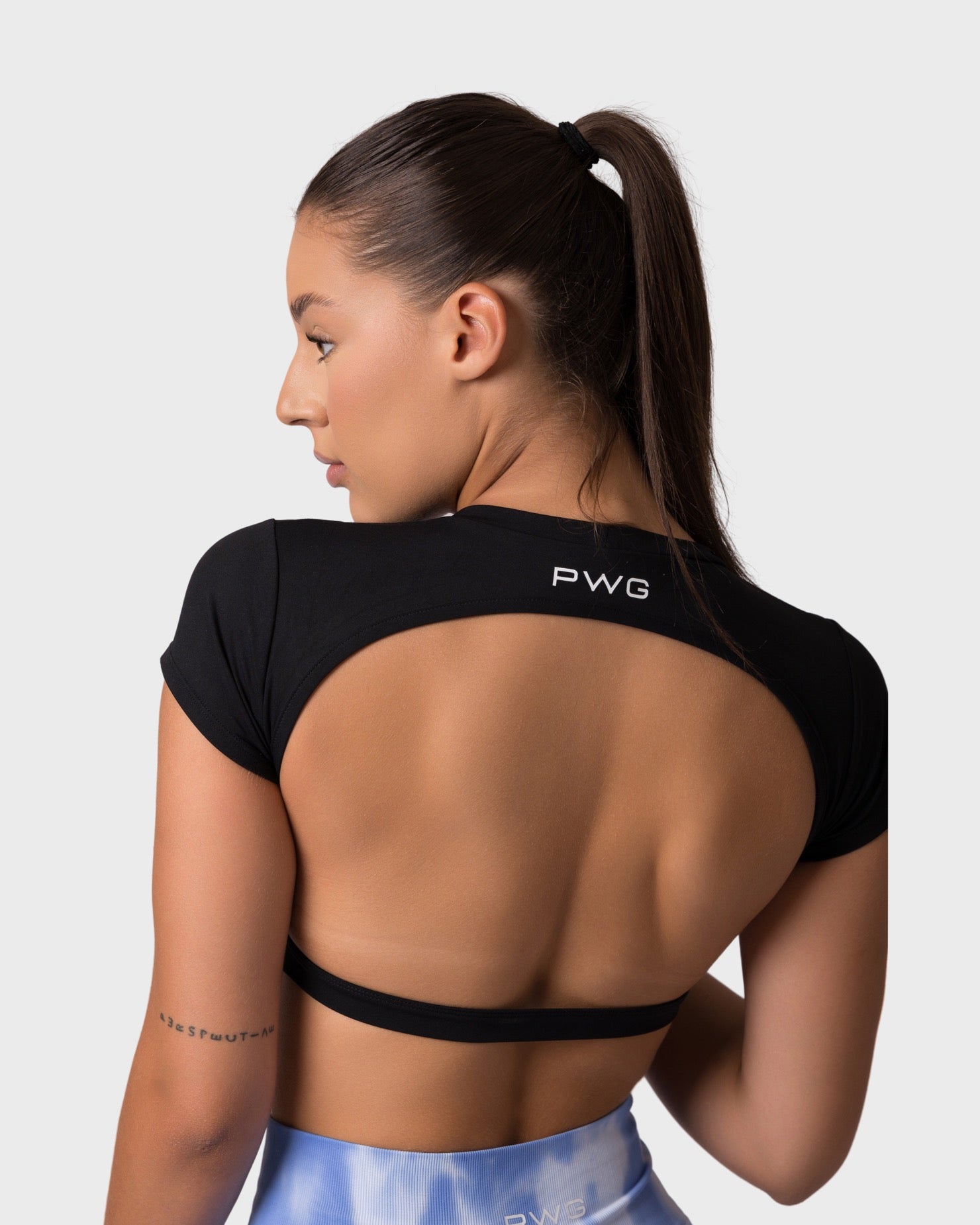 PWG x CC Short Sleeve Top in Black, eco-friendly, super soft design for confidence and style - Back View