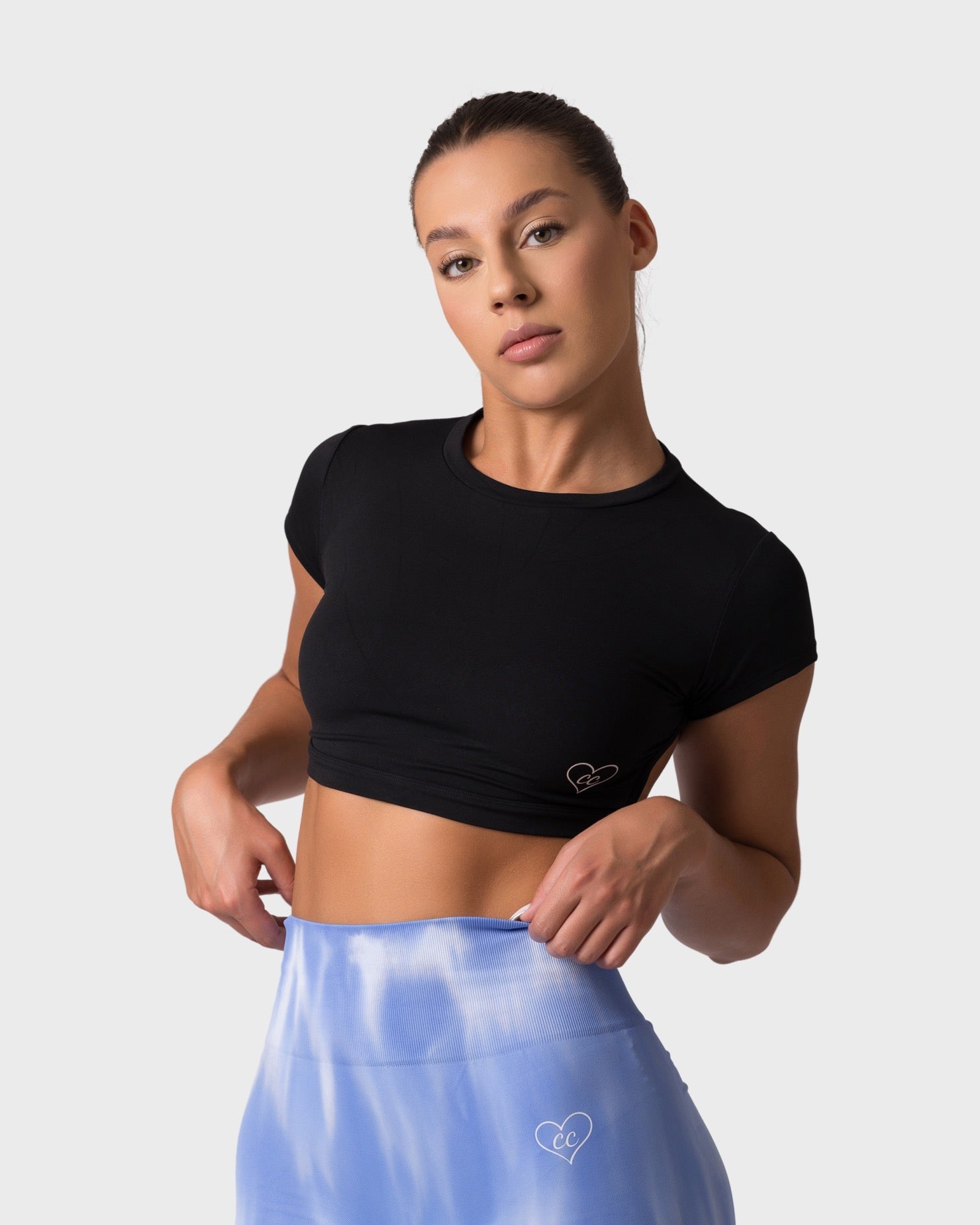 PWG x CC Short Sleeve Top in Black, eco-friendly, super soft design for confidence and style - Front View