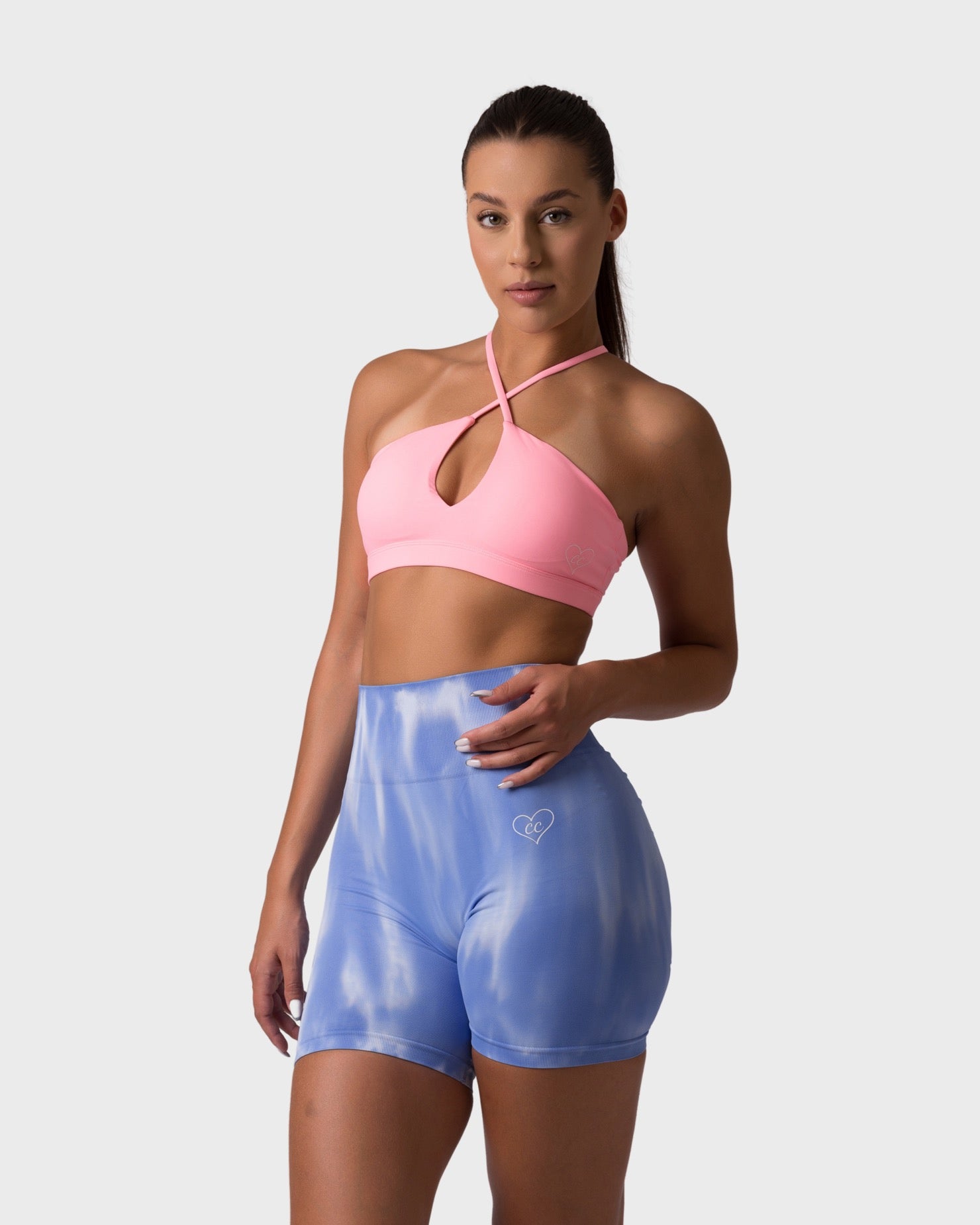 PWG x CC Cross-Shoulder Bra in Rose, eco-friendly, super soft, comfortable, and designed for fitness confidence - Front View