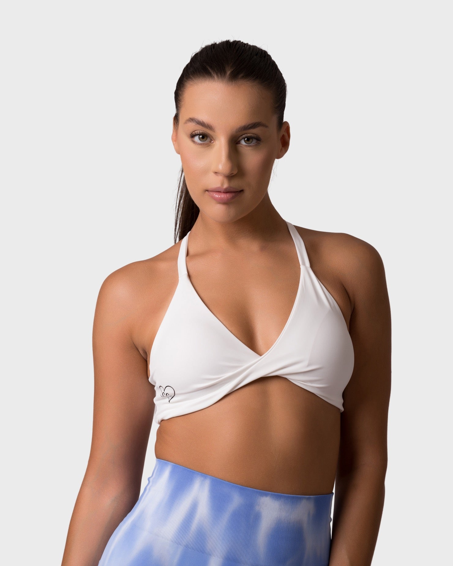 PWG x CC Knitted Sports Bra in White, eco-friendly, super soft, comfortable, and designed for fitness confidence - Front View