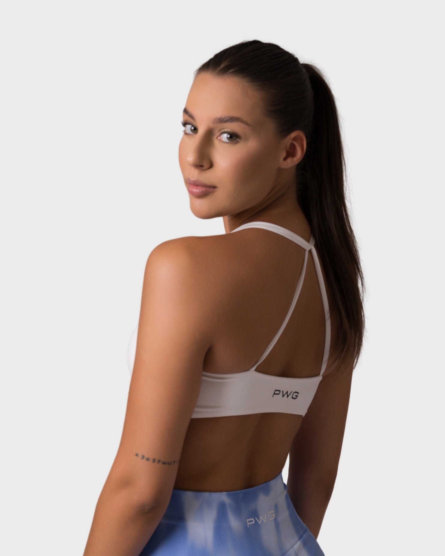 PWG x CC Knitted Sports Bra in White, eco-friendly, super soft, comfortable, and designed for fitness confidence - back view
