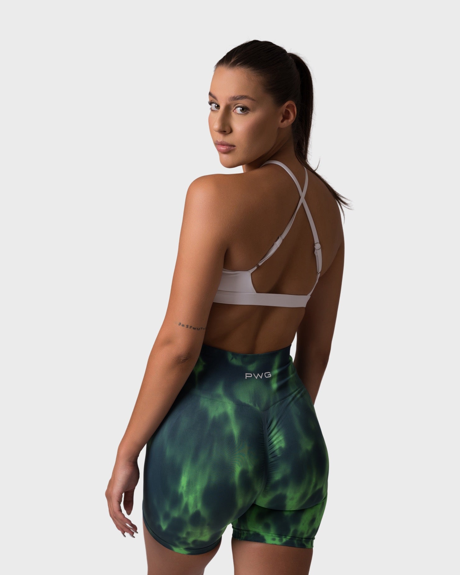 PWG x CC Shorts in Emerald, eco-friendly, super soft, butt-lifting design for comfort and fitness confidence - Back View