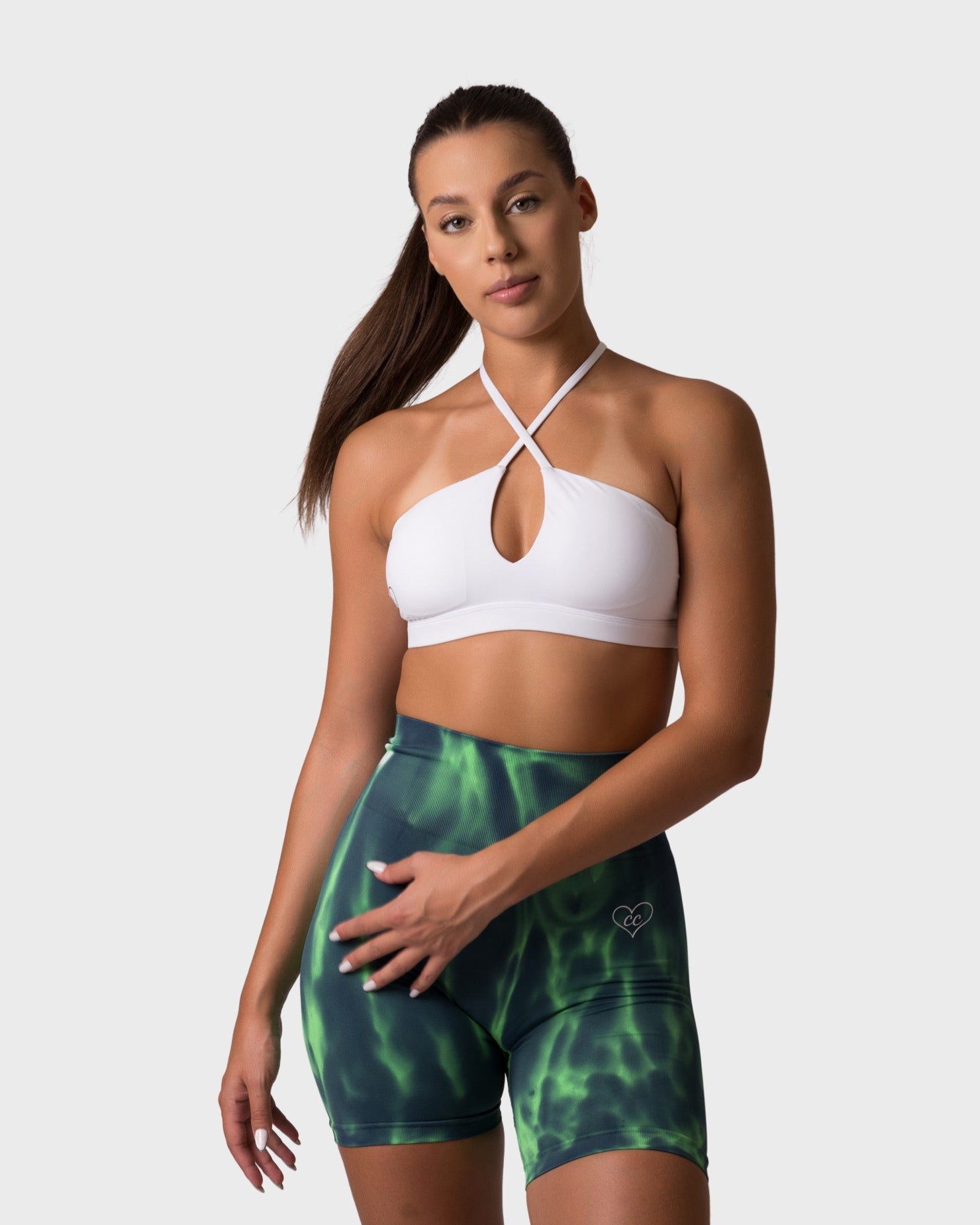 PWG x CC Cross-Shoulder Bra in White, eco-friendly, super soft, comfortable, and designed for fitness confidence - Front View