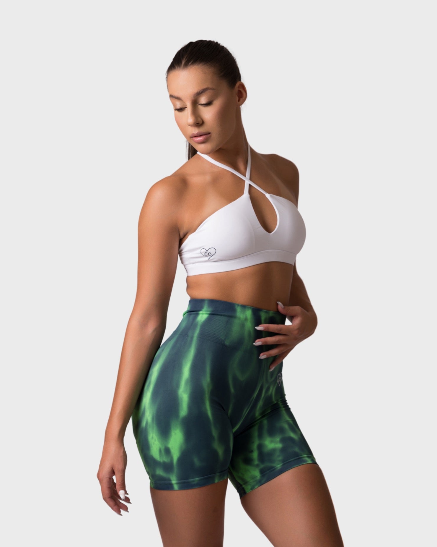 PWG x CC Cross-Shoulder Bra in White, eco-friendly, super soft, comfortable, and designed for fitness confidence