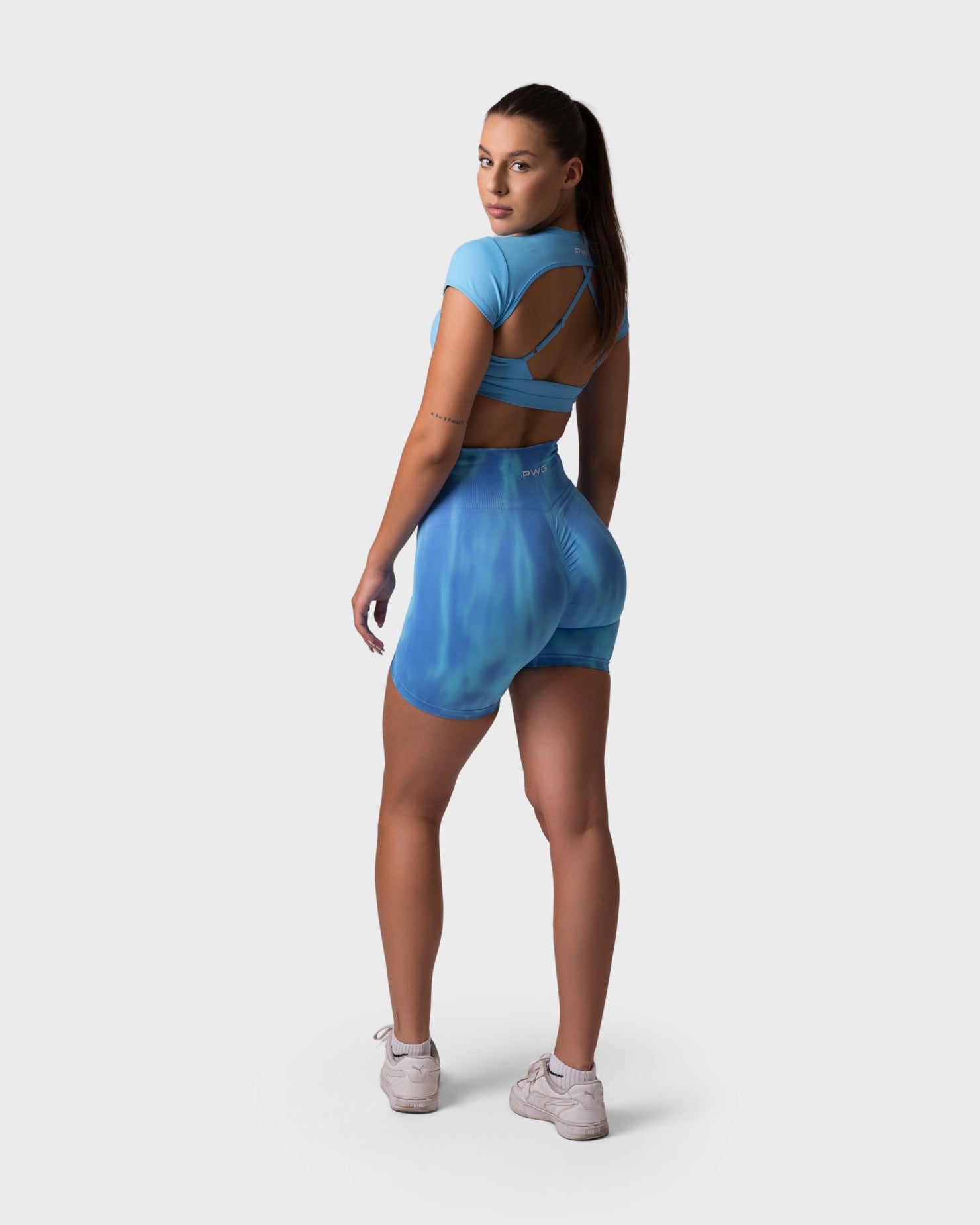 PWG x CC Shorts in Midnight Indigo, eco-friendly, super soft, butt-lifting design for comfort and fitness confidence - Back View