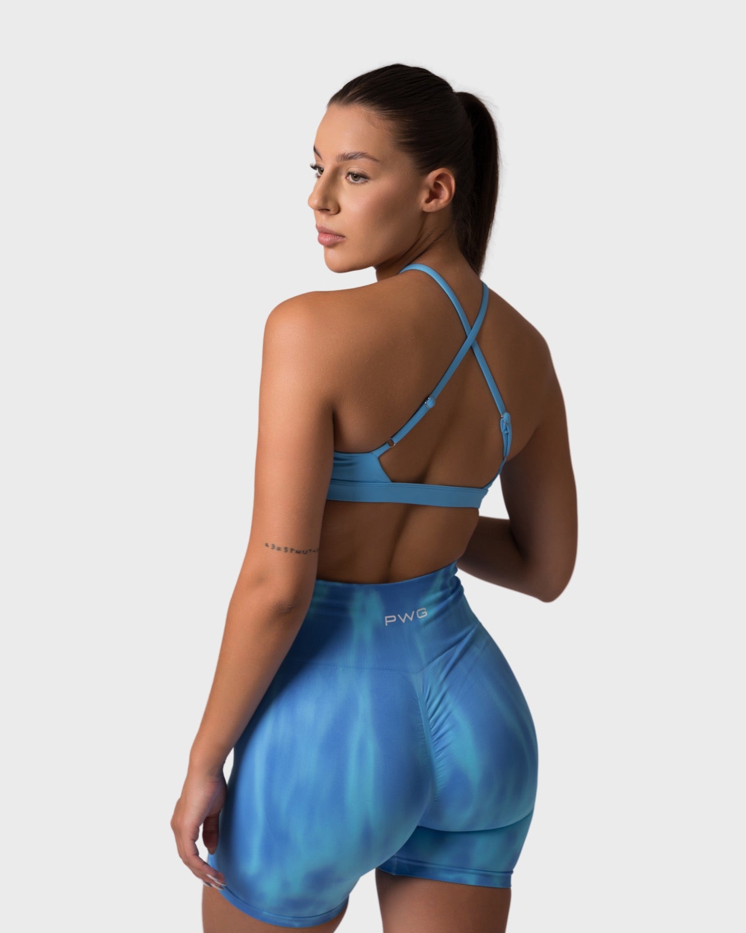 PWG x CC Shorts in Midnight Indigo, eco-friendly, super soft, butt-lifting design for comfort and fitness confidence - Back View