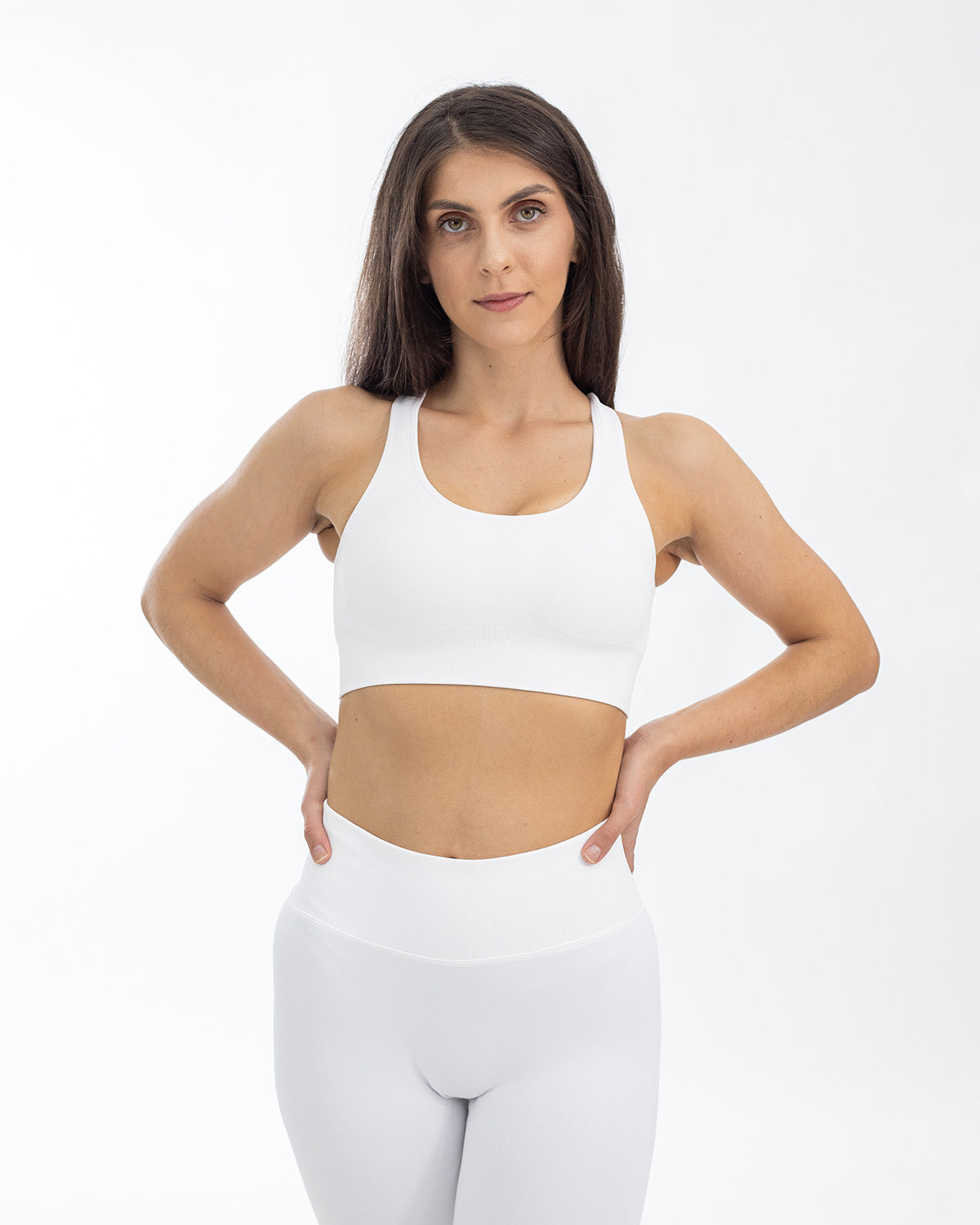 PWG Active Boost+ Open Back Sports Bra in White, body fit, open back, medium support, plunge neckline, embossed design - Front view