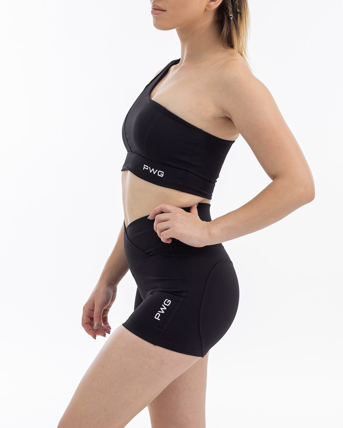 PWG Active Sense Lux One Shoulder Sports Bra in Black, body fit, medium support, embossed contour lines, heat-sealed logo - Side View