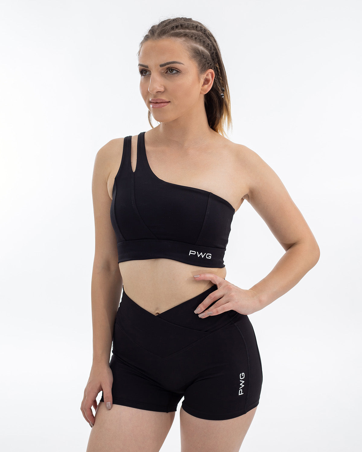 PWG Active Sense Lux One Shoulder Sports Bra in Black, body fit, medium support, embossed contour lines, heat-sealed logo - Front view