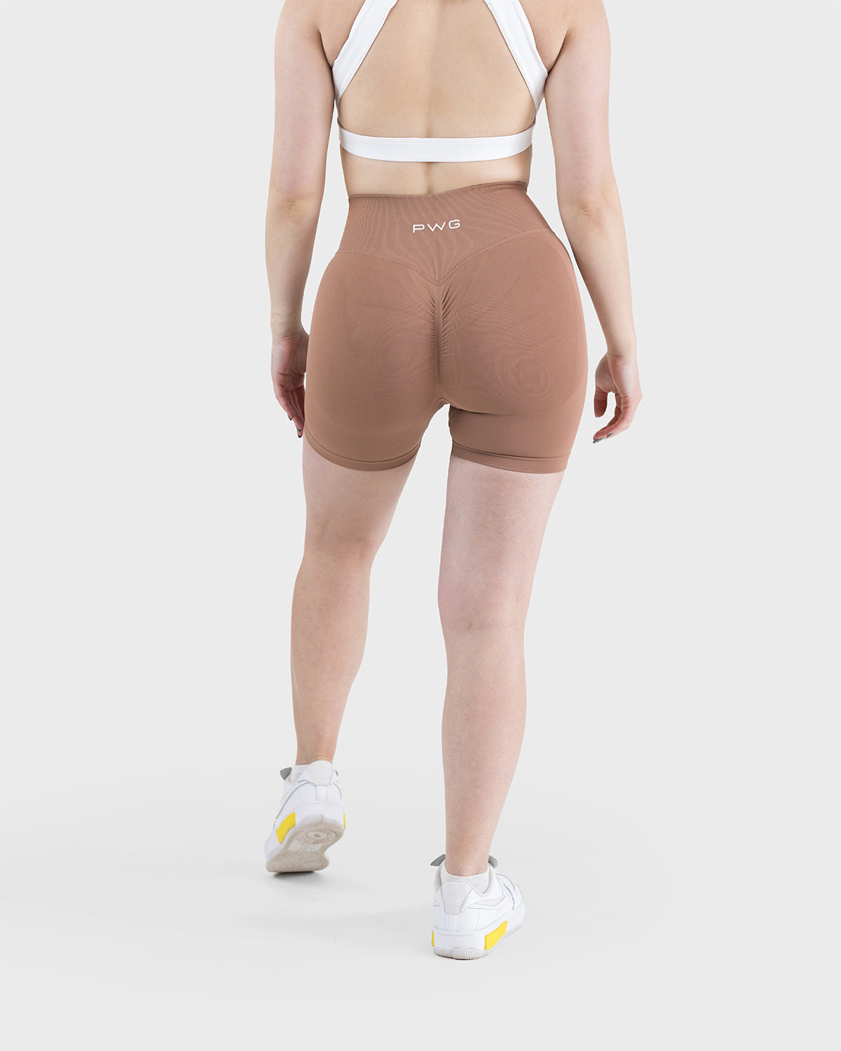 PWG Active Form Sculpting Shorts in Maple Brown, high ribbed waistband, sculpting design, scrunch back, 4” inseam - Back View