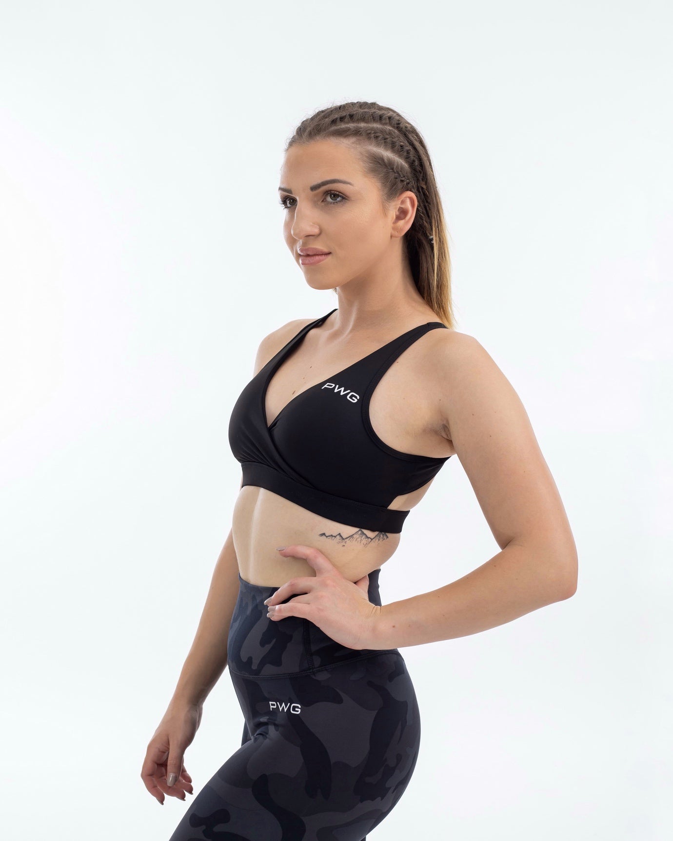 PWG Active Form Open Back Sports Bra in Black, plunge V-neck, open back, medium support, removable padding, heat-sealed logo - Side View